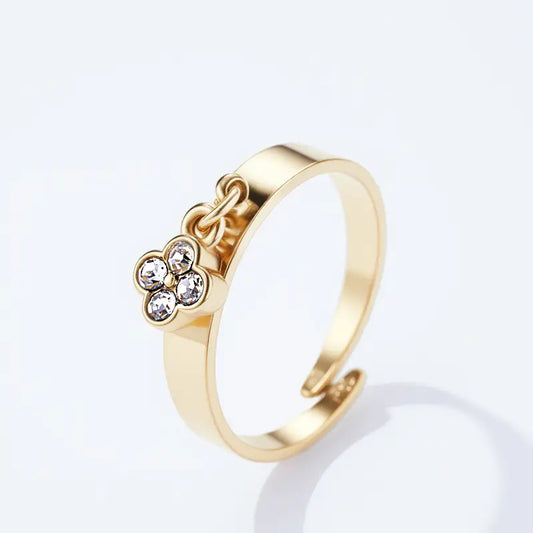 Fleur de Lumière Edelstahlring mit Blütenanhänger (Goldfarben)