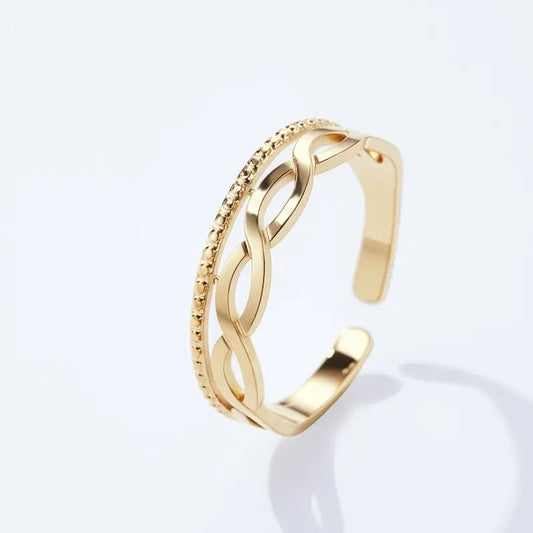 Liora Handschmuck Edelstahlring mit Flechtmuster (Goldfarben)